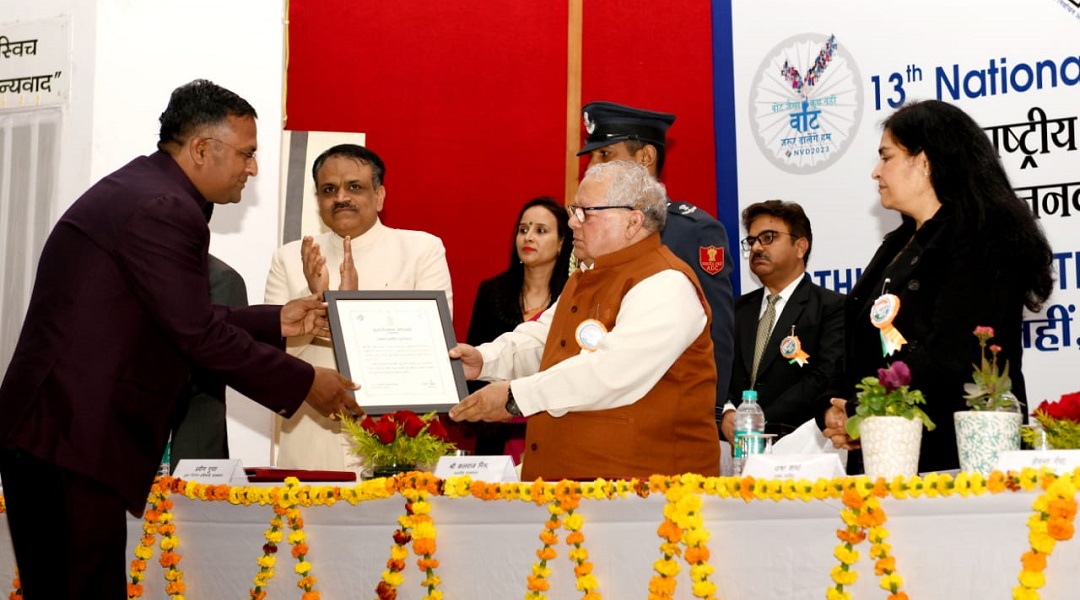 Official being awarded by Hon'bel Governor for special contribution in elaection related activities in Rajasthan. 